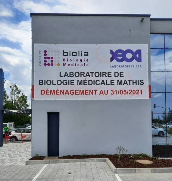 Pose d'une bâche tendue pour un laboratoire situé à Sélestat proche de Colmar